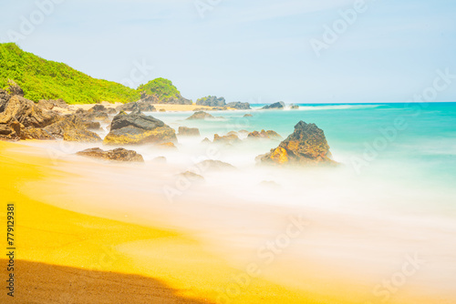 Summer quiet beach at Yanzi Cave, Qinwan, Wanning Mountain, Hainan, China photo