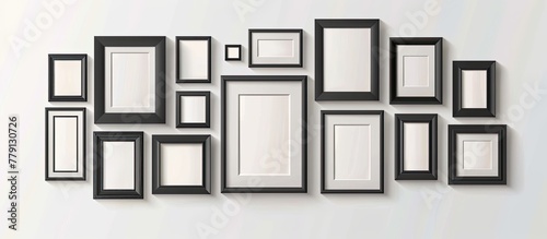 An array of picture frames, varying in shape between rectangles and squares, hang symmetrically on a wall, displaying a pattern of tints and shades