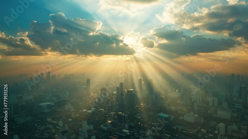 Sun rays breaking through clouds over urban skyline, suitable for weather or cityscape concepts