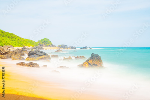 Summer quiet beach at Yanzi Cave, Qinwan, Wanning Mountain, Hainan, China photo