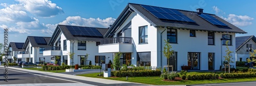 A picturesque row of homes adorned with solar panels on their rooftops, creating a sustainable and energy-efficient environment