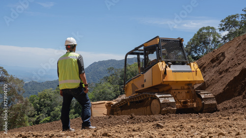 Inspectors observe road construction projects