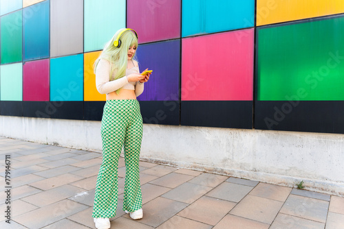 Modern girl with green hair at the art university