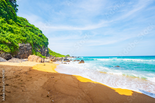 Summer quiet beach at Yanzi Cave, Qinwan, Wanning Mountain, Hainan, China photo