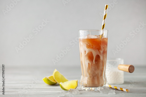 Homemade Cold Dirty Soda with  Coconut Cream, Ice and Lime. Alcohol free mocktail