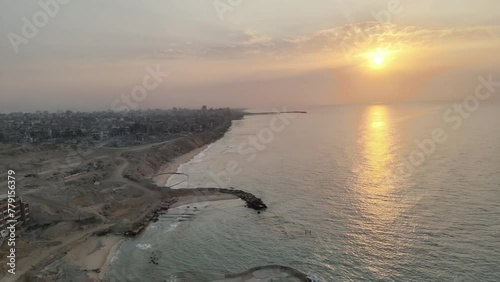 North Gaza at war, building destroyed, aerial sunset shot, 2024
Drone view over North Gaza buildings bombarded,Gaza-March,20,2024
 photo