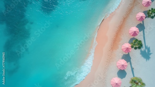 Stunning top-down view of a white sandy beach with clear turquoise waters and pink umbrellas providing a vivid contrast