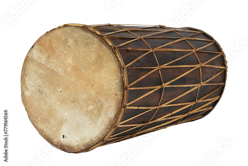 Kendang or gendang is a traditional Indonesian musical instrument made from a tree trunk which has been hollowed out and covered with cow or goat skin photo