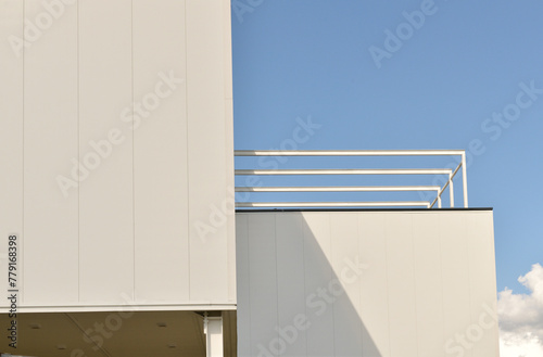 Fragment of a building with walls made of sandwich panels