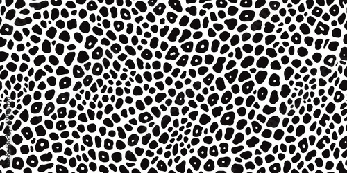 Abstract black and white pattern with small dots in the form of snake skin texture