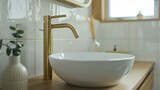 A white bowl sink placed on a wooden counter, suitable for home renovation projects