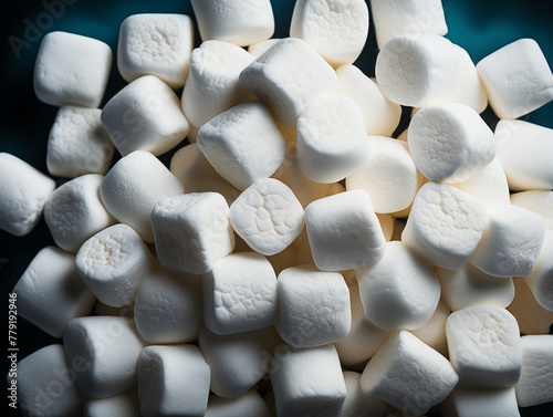Close-up of white marshmallows piled together photo
