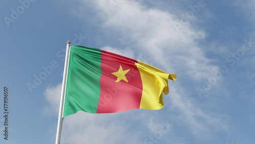 flag of cameroon on a blue sky, waving in the wind, symbol of the cameroun, african country, green and red with yellow star, tall flagpole, sunny day photo