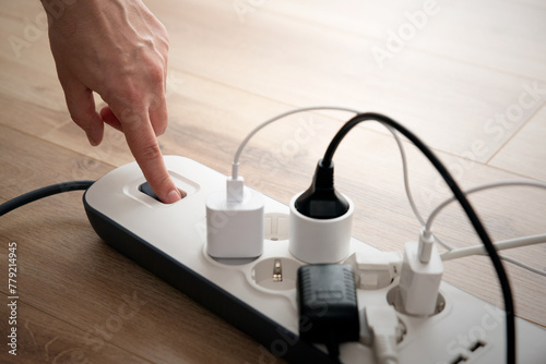 Power strip socket with connected plugs.