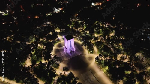 Alvaro Obregon Monument illuminated in purple at night in CDMX photo