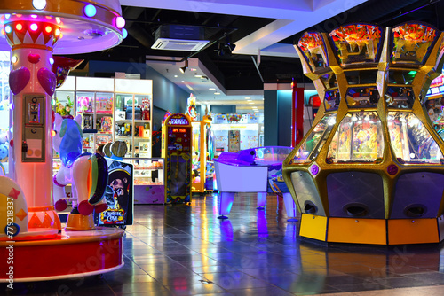 Play fun area for gamer with various bright colorful attractions and slot machines