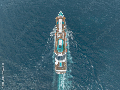Cruise ship sailing on tropical islands
