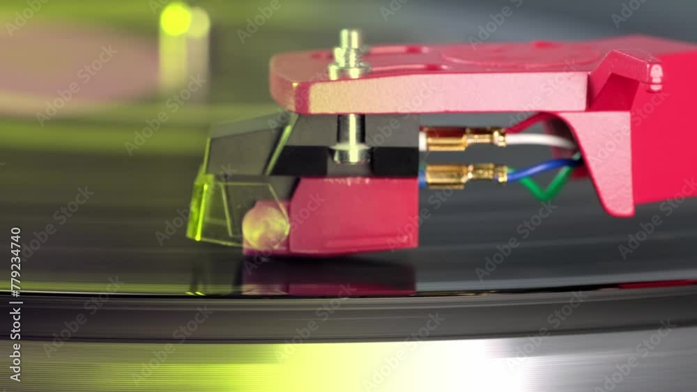 close-up pickup head of analog player, pickup stylus smoothly slides along music tracks of vinyl disc, Art of Vinyl, Exploring Analog Turntable Cartridge and Stylus, Melody in Motion close-up pickup head of analog player, pickup stylus smoothly slides along music tracks of vinyl disc, Art of Vinyl, Exploring Analog Turntable Cartridge and Stylus, Melody in Motion