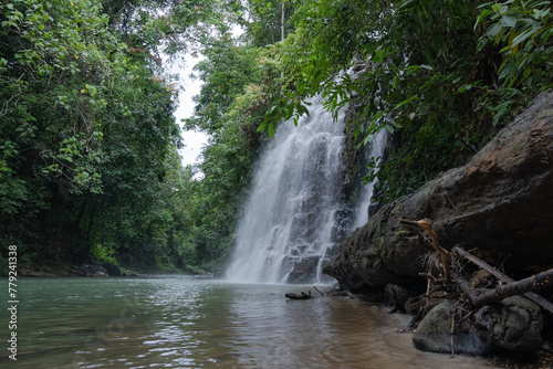 A beautiful waterfall hidden deep in the tropical rainforests of Indonesia