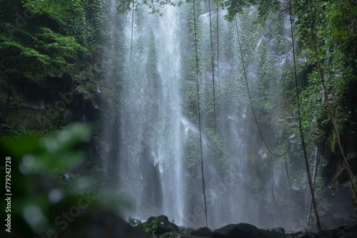 A beautiful waterfall hidden deep in the tropical rainforests of Indonesia