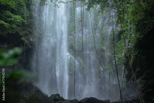 A beautiful waterfall hidden deep in the tropical rainforests of Indonesia