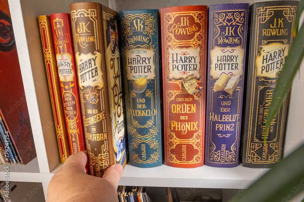 Fototapeta premium Magical Collection books Rowling Harry Potter, appealing to book lovers, Children's Entertainment, Friendship and Self-Discovery, Frankfurt - December 22, 2023