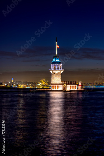 iery sunset over Bosphorus with famous Maiden's Tower (Kiz Kulesi) also known as Leander's Tower, symbol of Istanbul, Turkey. Scenic travel background for wallpaper or guide book © mehmet