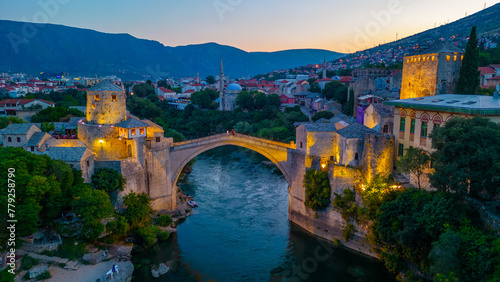 Sunset view of the old Mostar bridge in Bosnia and Herzegovina photo