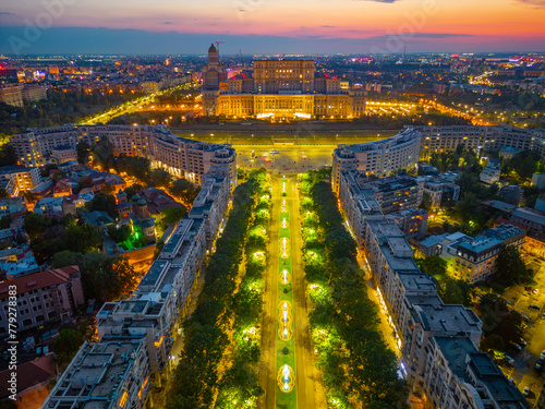 Sunset view of Bulevardul Unirii boulevard leading to the Romanian parliament in Bucharest photo