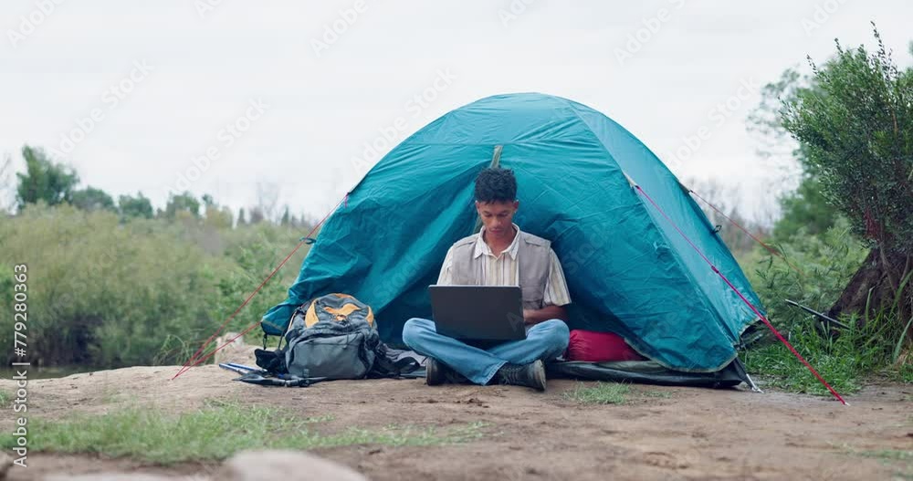 Man, camping and remote work with laptop in nature for planning, research or or internet solution. Freelance, tent and off grid digital nomad in forest for pc, search or travel blog content creation