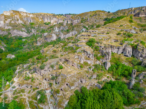 Old Khndzoresk abandoned cave town in Armenia photo