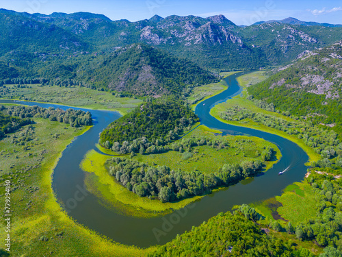 Meander of Rijeka Crnojevica river leading to Skadar lake in montenegro photo