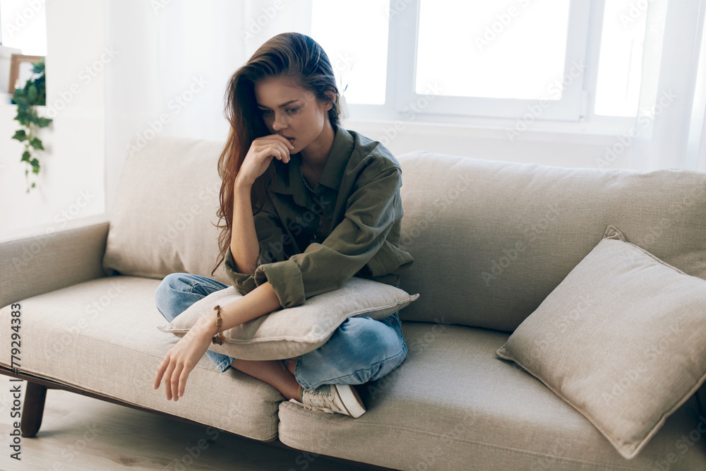 Lonely Woman on Sofa, Expressing Sadness and Mental Pain, Facing Troubles and Upset in Crisis.