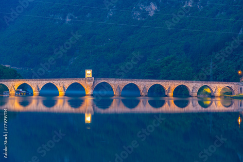 Sunrise view of Mehmed Pasa Sokolovic Bridge in Visegrad, Bosnia and Herzegovina photo