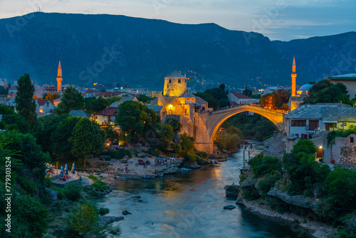 Sunset view of the old Mostar bridge in Bosnia and Herzegovina photo