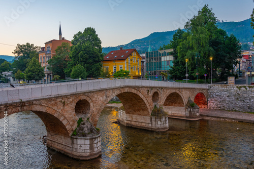 Sunset view of the Latin Bridge in the old town of Sarajevo, Bosnia and Hercegovina photo