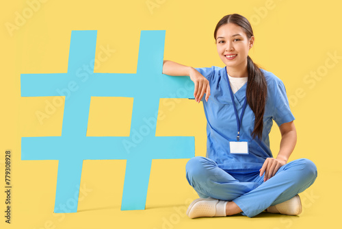 Young female doctor with ha...