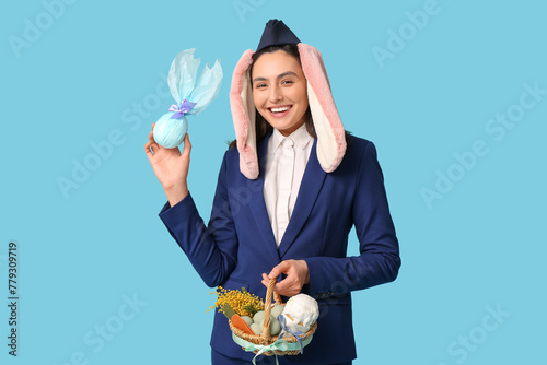 Happy stewardess in bunny e...