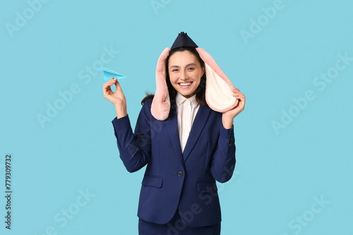 Happy stewardess in bunny e...