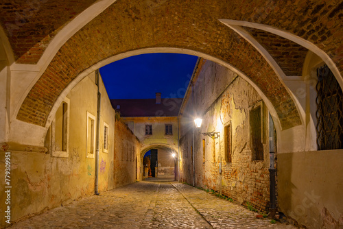 Quadro su tela Sunset view of the pedestrian street in the old town of Osijek, Croatia