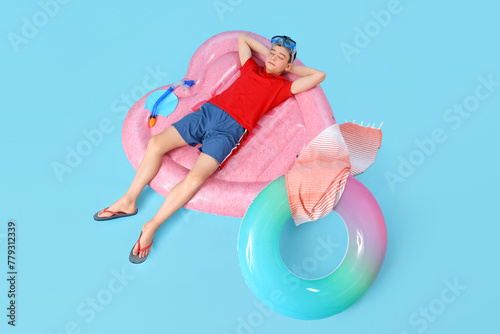 Cute little boy with snorke...