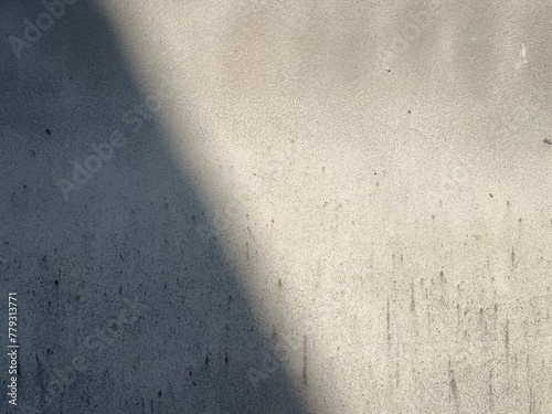 Light to shadows of concrete wall background