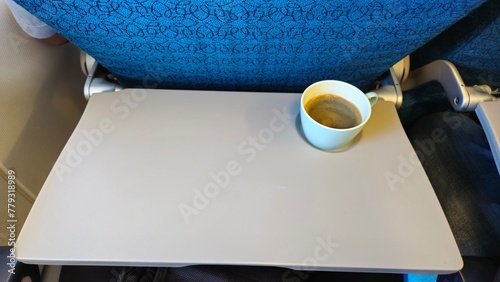 A passenger's coffee cup on a domestic flight from Hanoi, Vietnam.