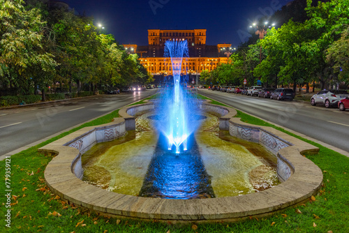 Sunset view of Bulevardul Unirii boulevard leading to the Romanian parliament in Bucharest photo