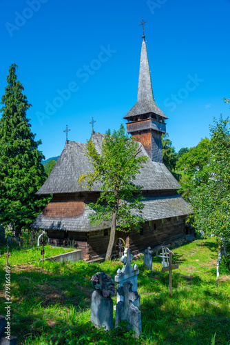 Wooden church Paraschiva at Poienile Izei in Romania photo