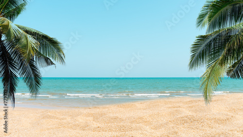 Fototapeta Naklejka Na Ścianę i Meble -  Palm tree on tropical beach with blue sky and white clouds abstract background. Copy space of summer vacation and business travel concept. Vintage tone filter effect color style.