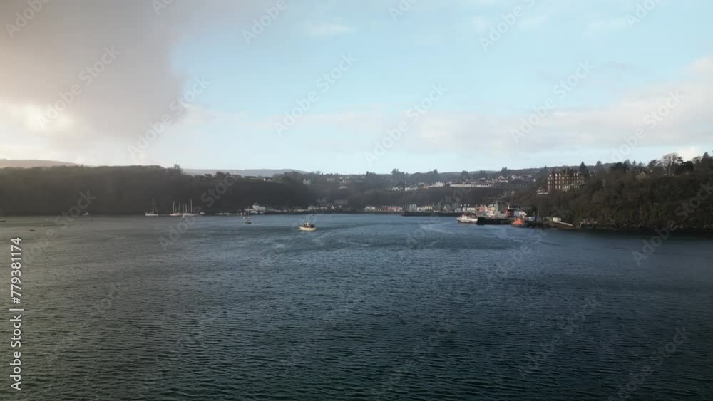 Forward Linear Aerial of Boats Floating on a Body of Water Close to the Harbor of Tobermory