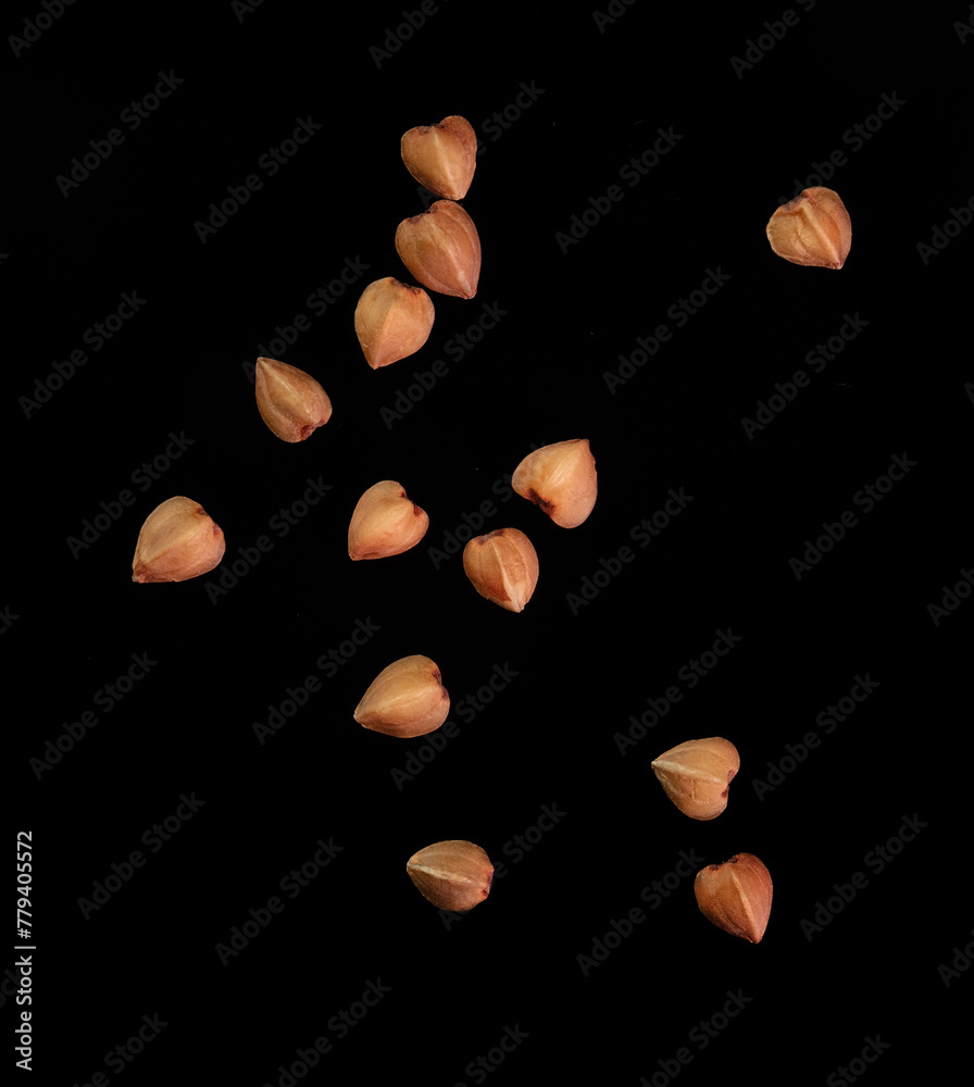 Buckwheat isolated on a black background. Close-up Buckwheat isolated on a black background. Close-up
