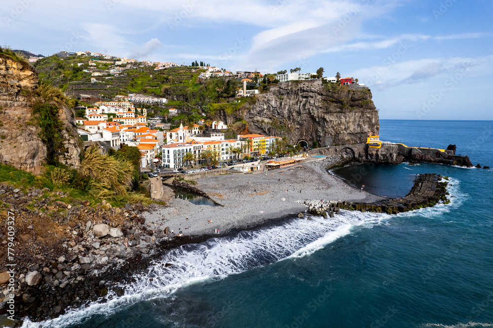 Ponta do Sol in Madeira Island, Portugal. Aerial drone view at cityscape of coastal town and beach