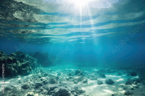 Underwater Seascape with Sun Rays Penetrating Through the Surface © KirKam